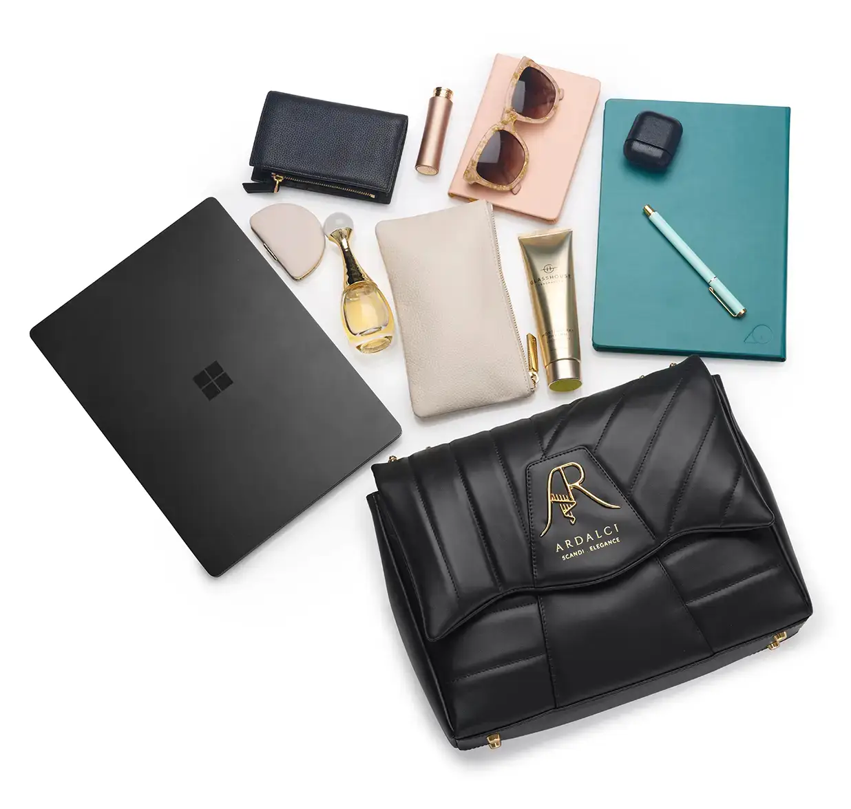 Ardalci Lykke with laptop and makeup.webp
